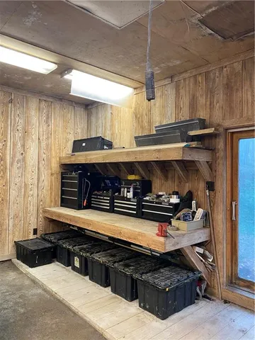 a kitchen with stainless steel appliances a stove and a microwave