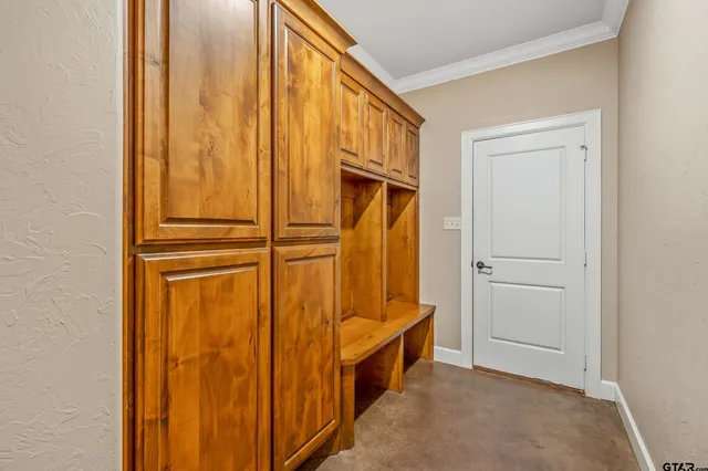 a stove top oven sitting inside of a kitchen