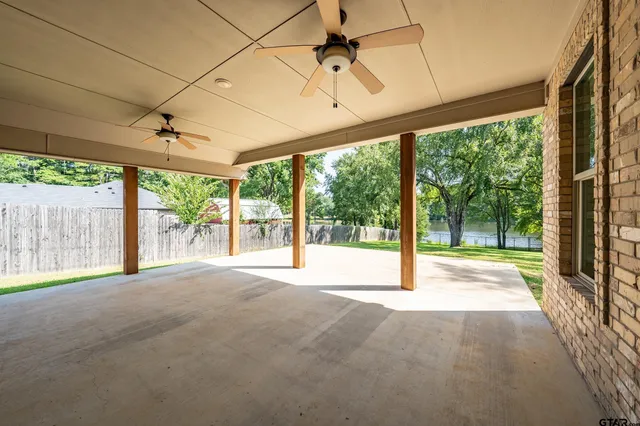a view of a room with a large window