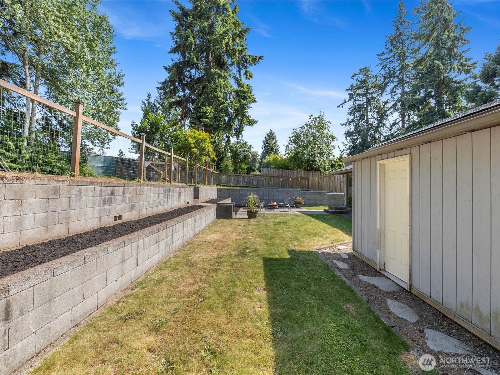 4913 West View Drive Everett, WA 98203 - Photo 21 of 37 a view of a backyard with swimming pool