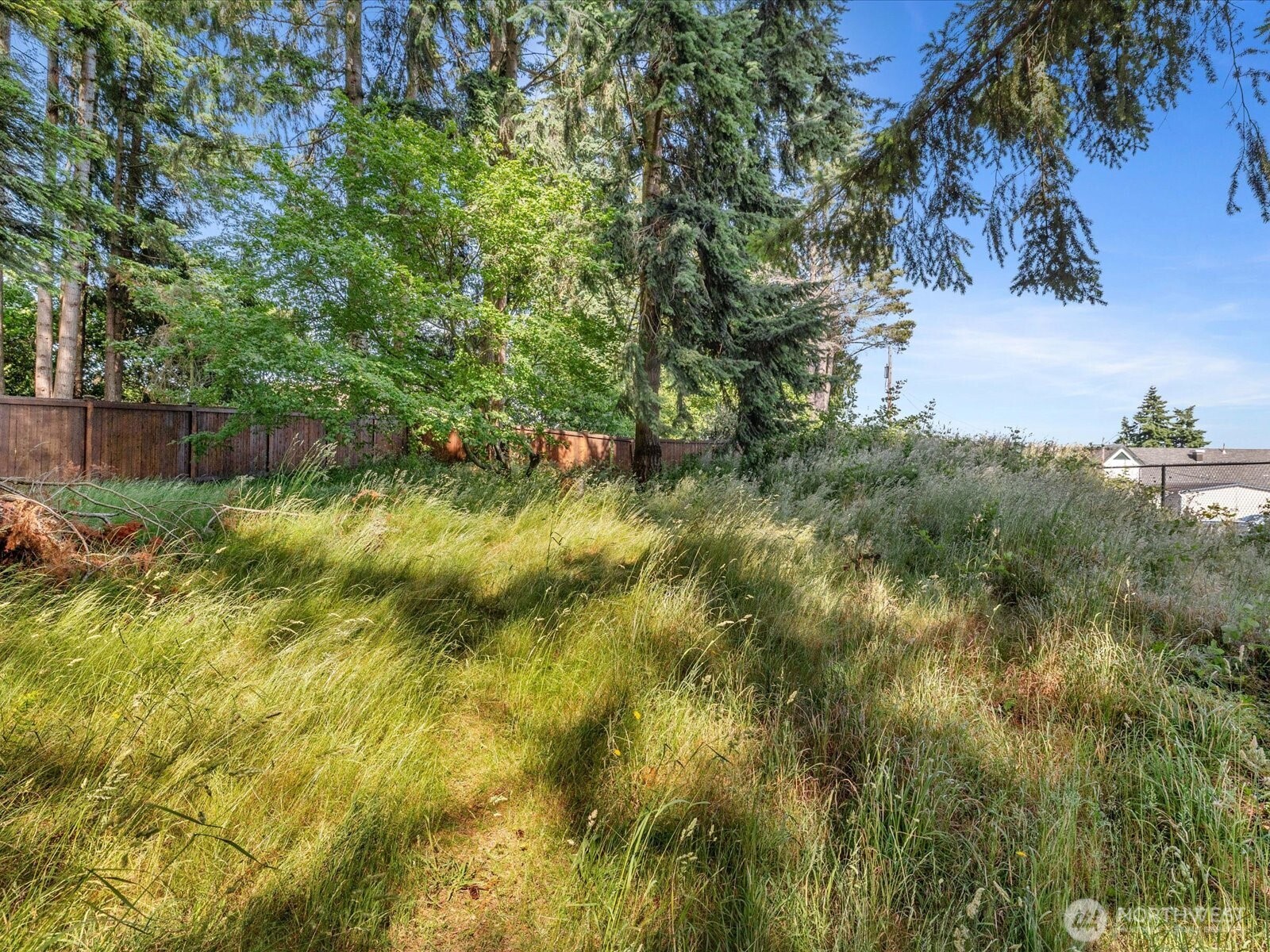 4913 West View Drive Everett, WA 98203 - Photo 27 of 37 a view of a lake with top of house