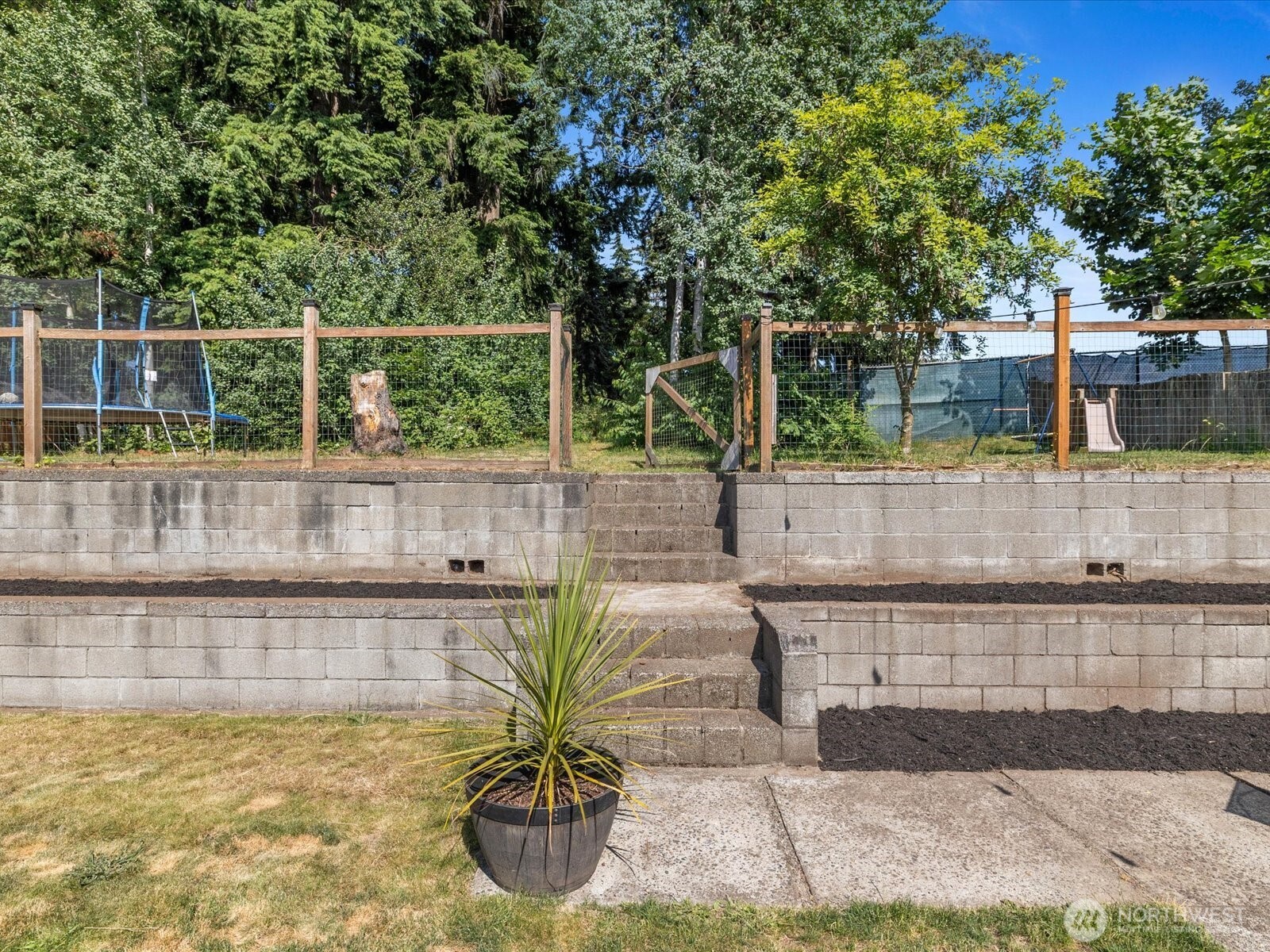 4913 West View Drive Everett, WA 98203 - Photo 30 of 37 a view of a swimming pool with a patio