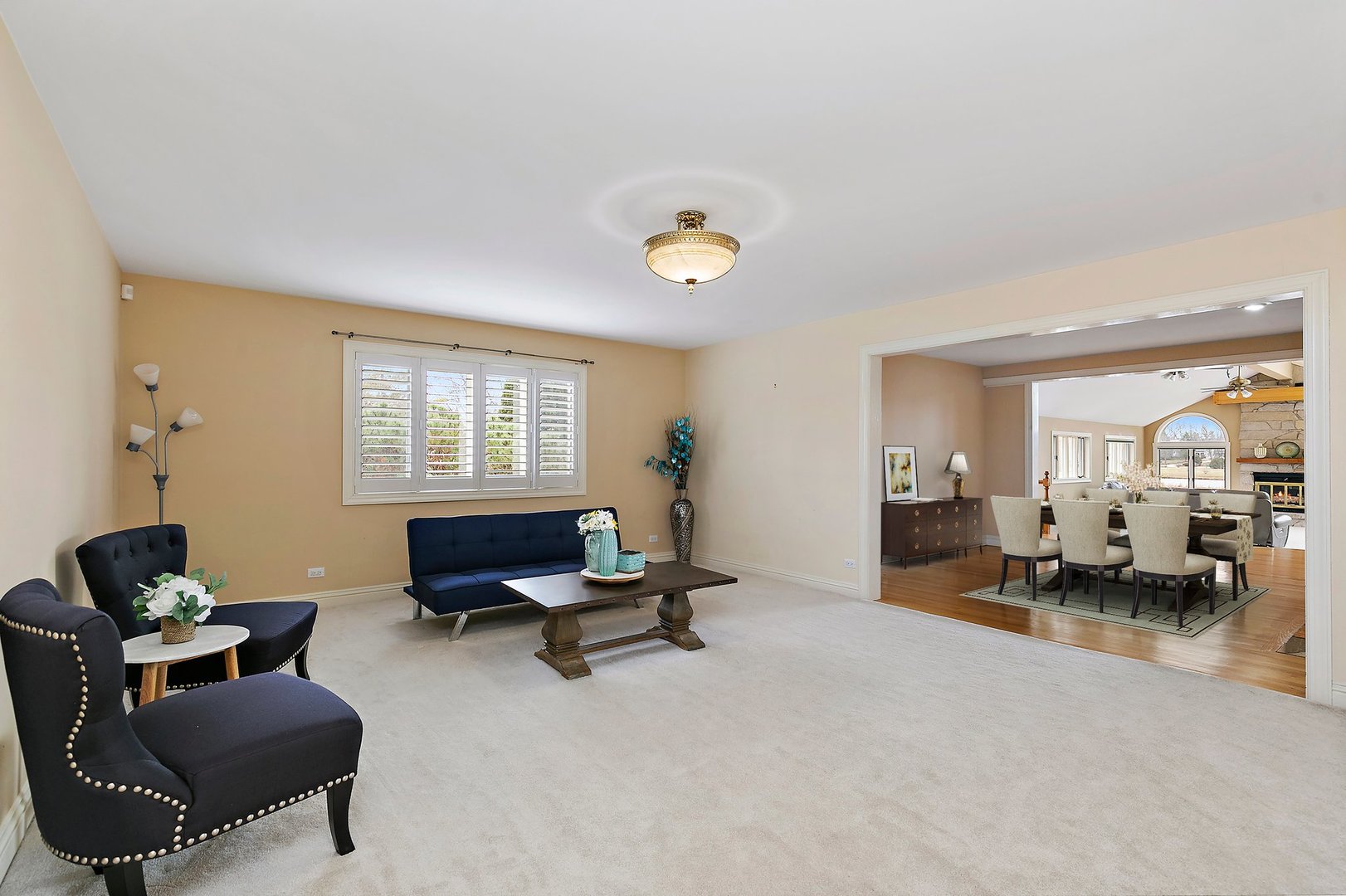 741 Braintree Lane Bartlett, IL 60103 - Photo 11 of 80 a living room with furniture gym equipment and a window