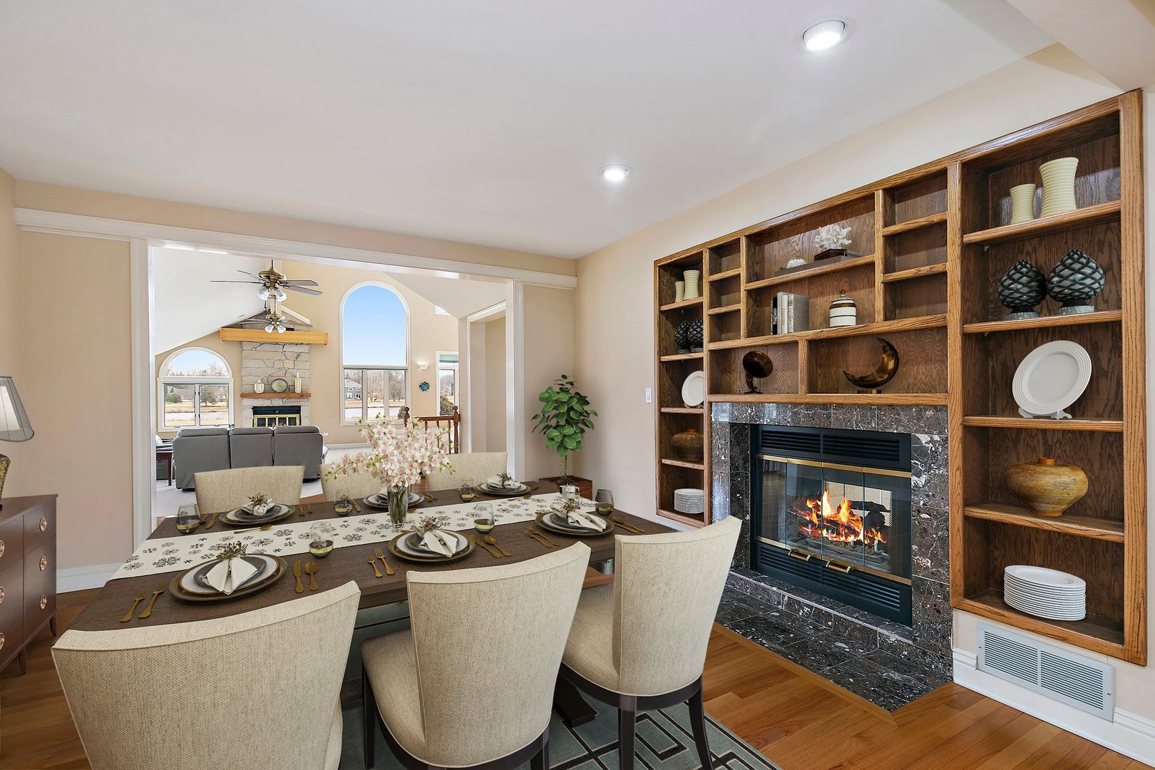 741 Braintree Lane Bartlett, IL 60103 - Photo 12 of 80 a living room with furniture a rug and a bookshelf