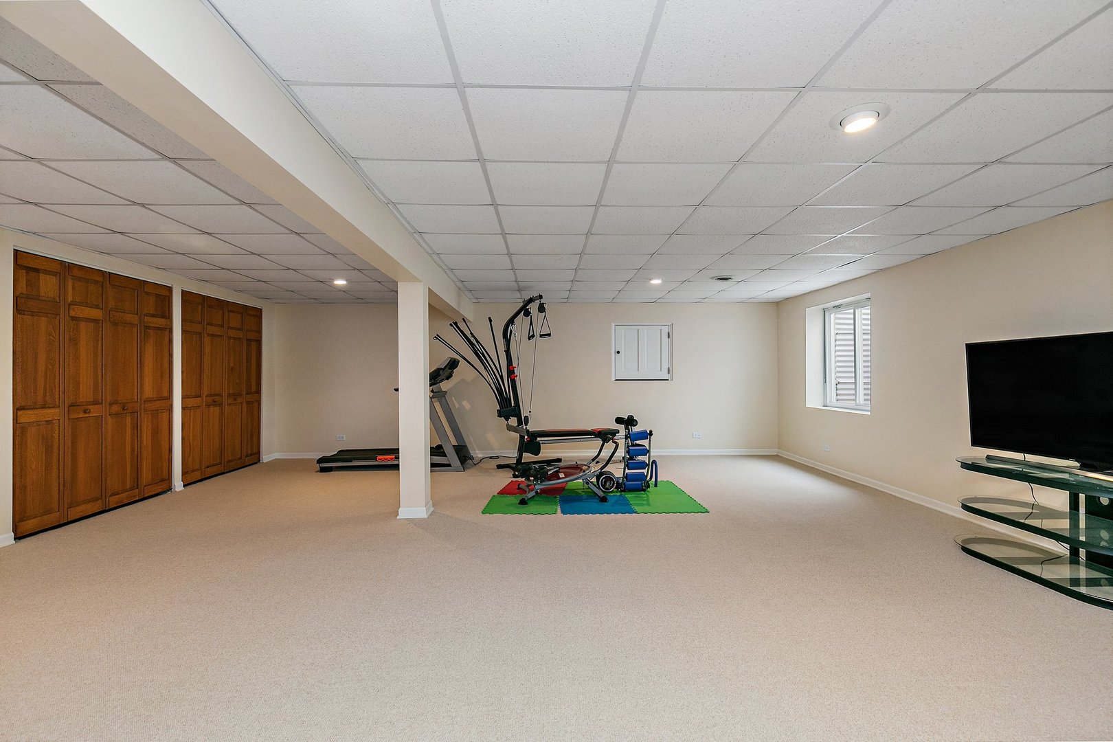 741 Braintree Lane Bartlett, IL 60103 - Photo 62 of 80 a living room with furniture and a flat screen tv