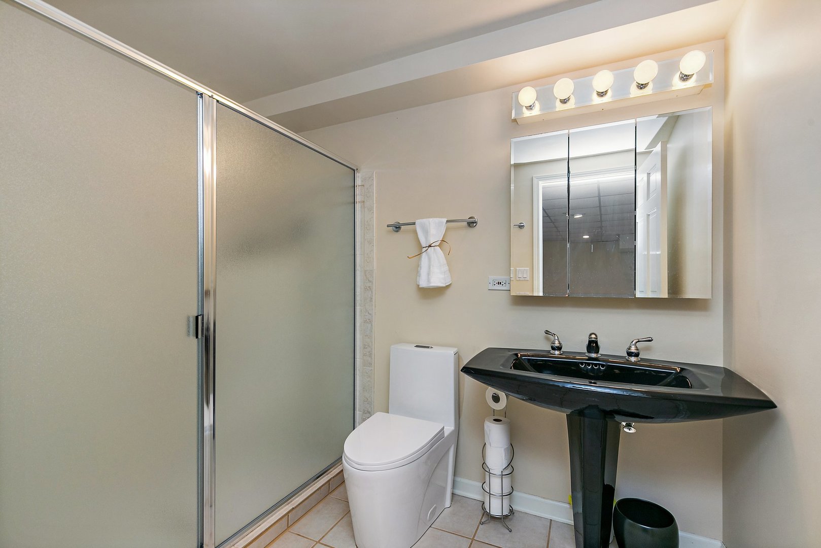 741 Braintree Lane Bartlett, IL 60103 - Photo 63 of 80 a bathroom with a granite countertop sink toilet and shower