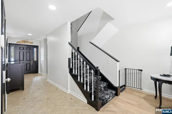 a view of a hallway with staircase