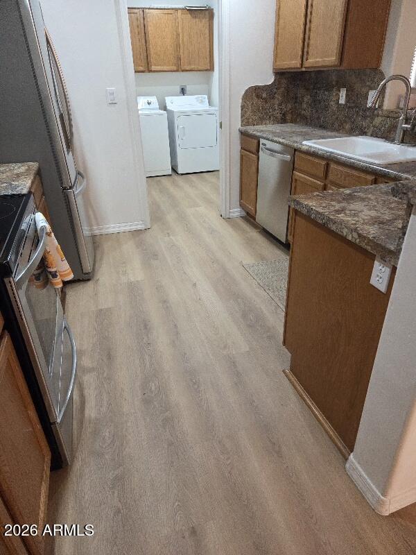 5830 East McKellips Road, Unit 100 Mesa, AZ 85215 - Photo 2 of 48 a kitchen with a stove and a refrigerator