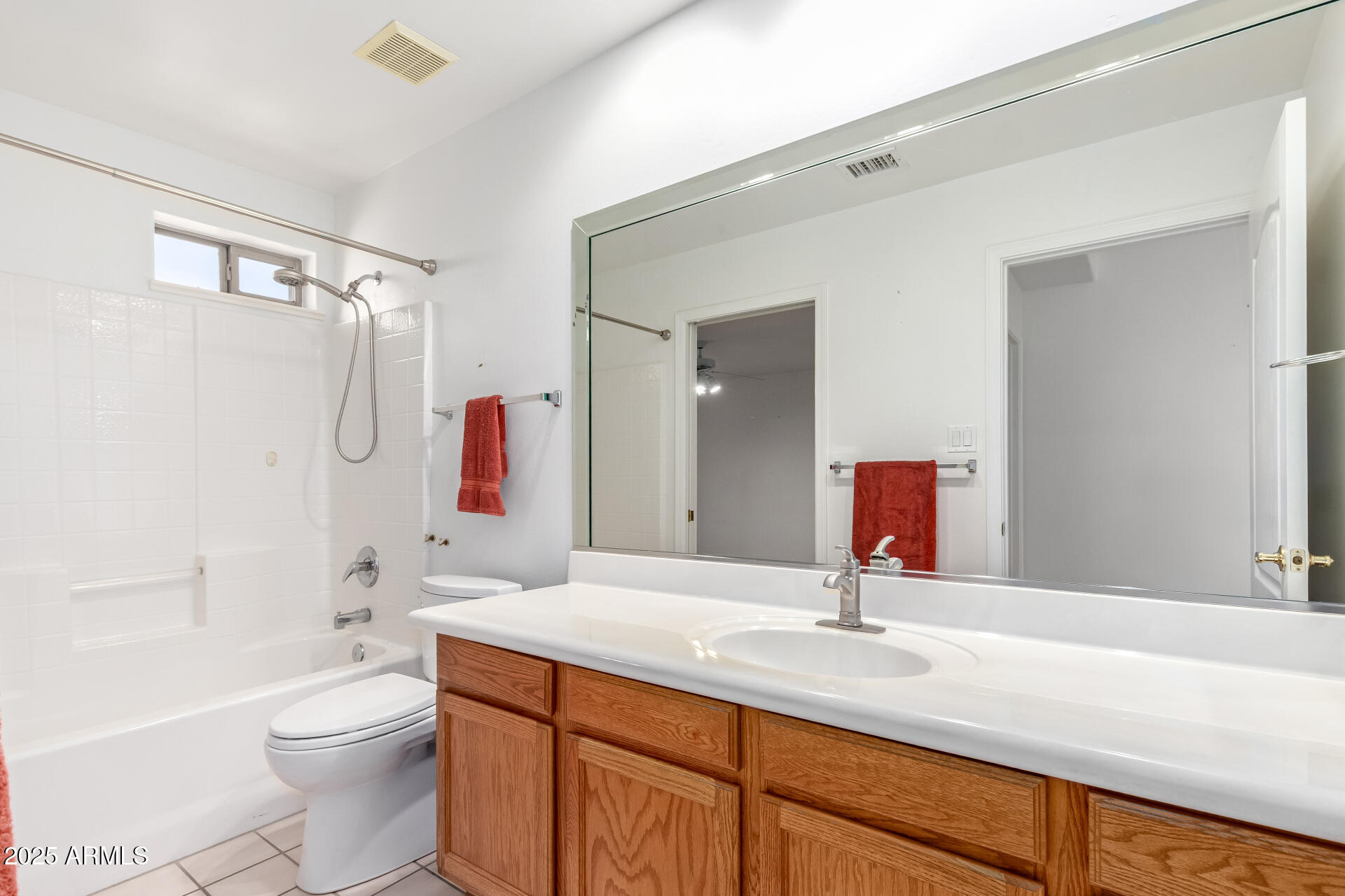 5830 East McKellips Road, Unit 100 Mesa, AZ 85215 - Photo 25 of 48 a bathroom with a sink a toilet and shower