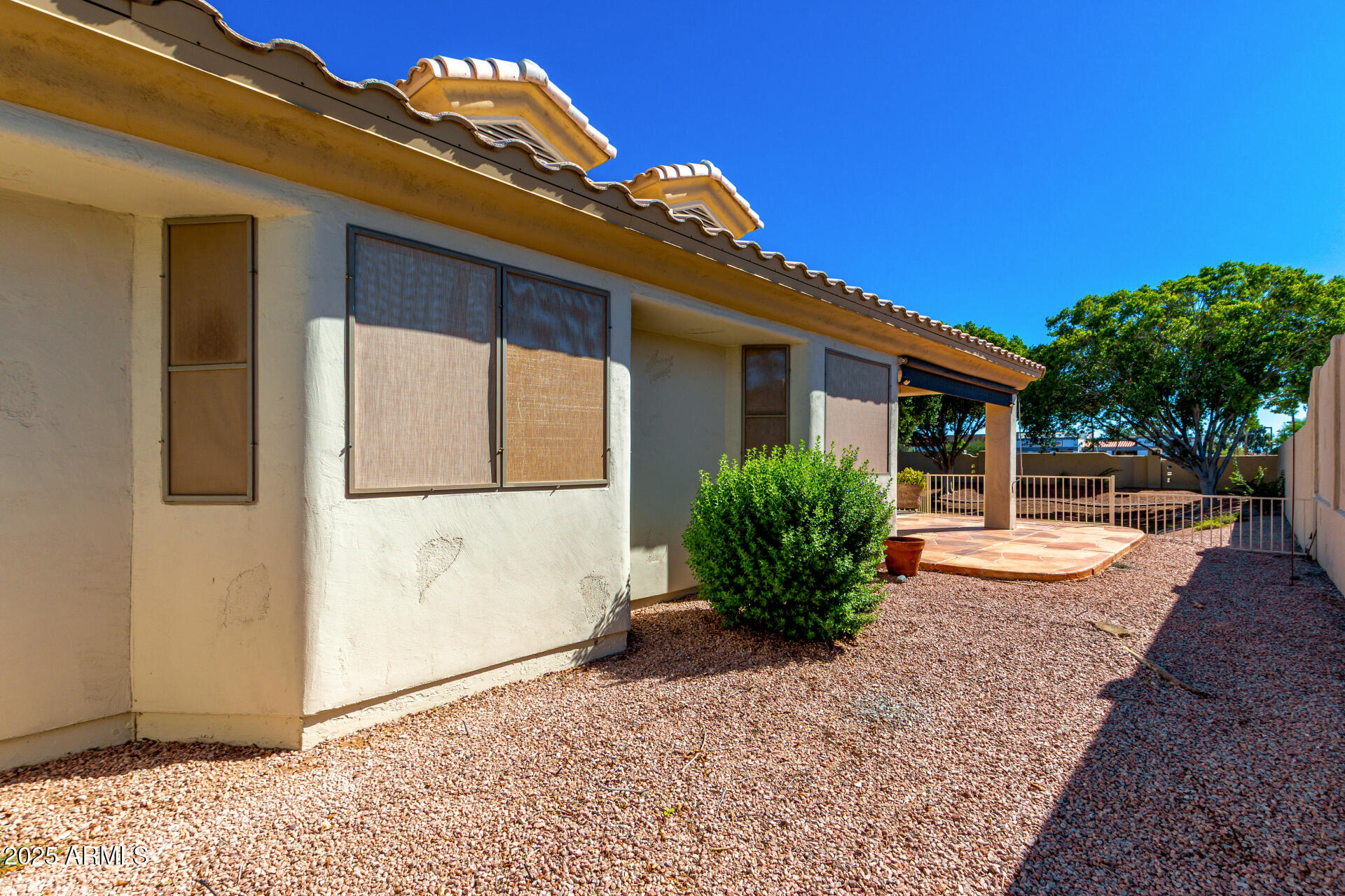 5830 East McKellips Road, Unit 100 Mesa, AZ 85215 - Photo 32 of 48 a view of a porch with a patio