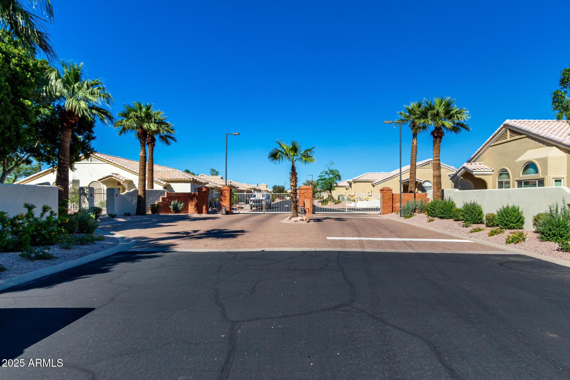 5830 East McKellips Road, Unit 100 Mesa, AZ 85215 - Photo 36 of 48 a view of street with parked cars