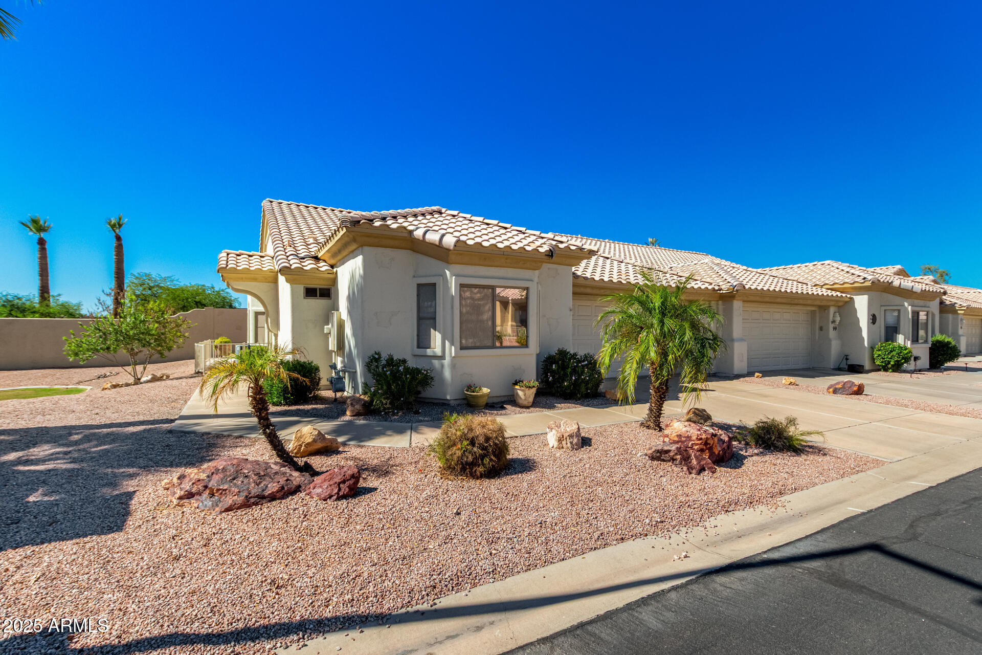 5830 East McKellips Road, Unit 100 Mesa, AZ 85215 - Photo 37 of 48 a view of a house with backyard and sitting area