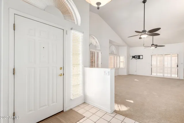 a view of empty room with windows