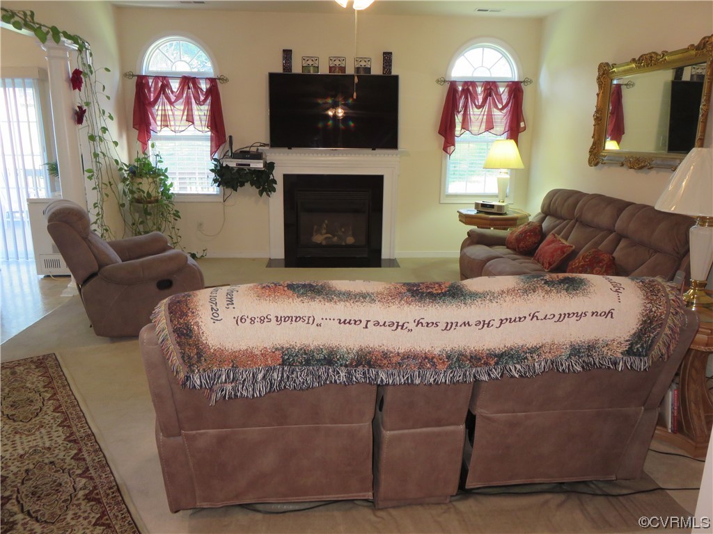 4740 Southmoor Road Richmond, VA 23234 - Photo 13 of 42 a bedroom with a bed and a flat screen tv