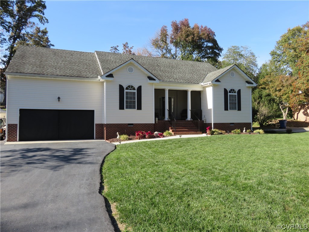 4740 Southmoor Road Richmond, VA 23234 - Photo 2 of 42 a front view of house with yard and green space