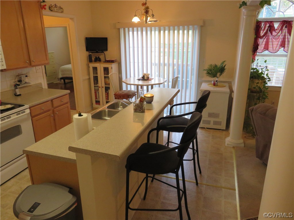 4740 Southmoor Road Richmond, VA 23234 - Photo 21 of 42 a view of a dining room with furniture window and wooden floor