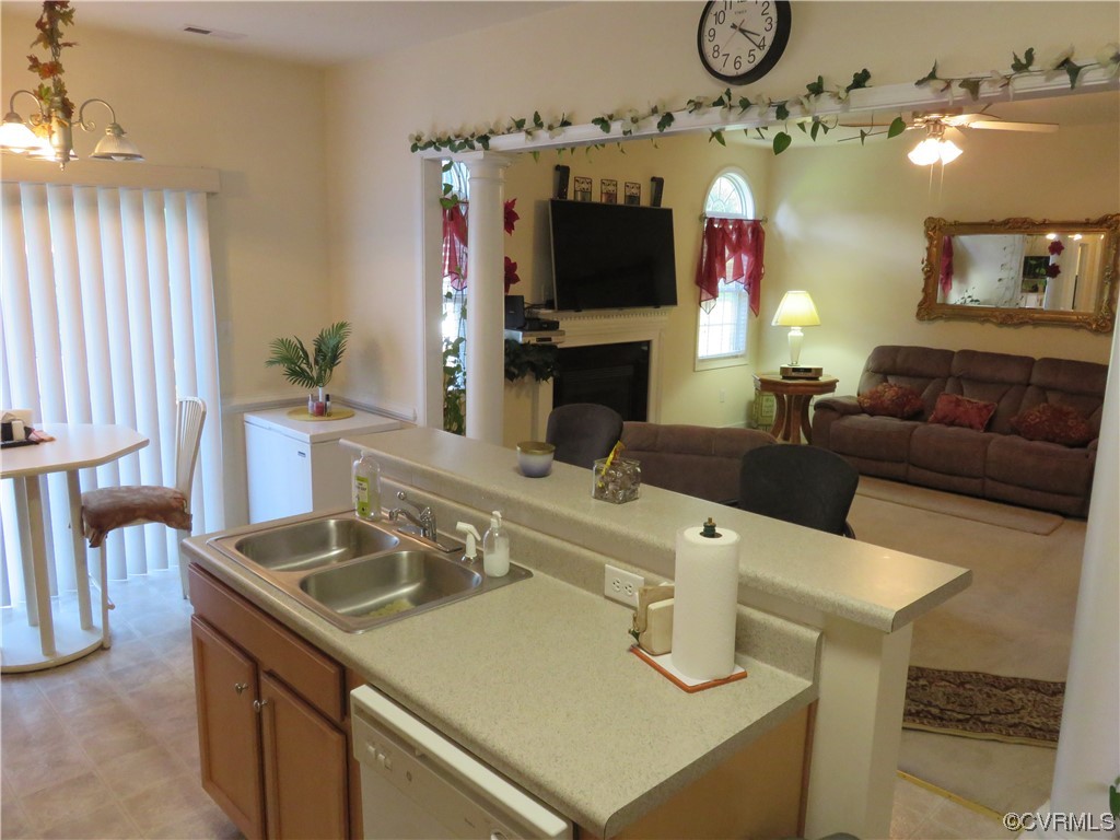 4740 Southmoor Road Richmond, VA 23234 - Photo 22 of 42 a living room with furniture and a flat screen tv