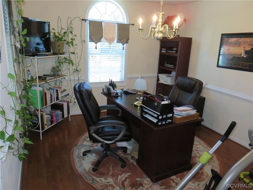 4740 Southmoor Road Richmond, VA 23234 - Photo 33 of 42 a work room with furniture and a flat screen tv