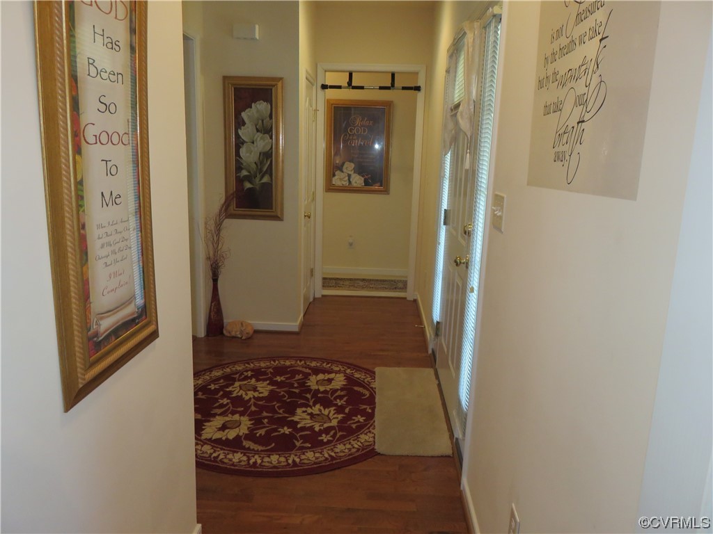 4740 Southmoor Road Richmond, VA 23234 - Photo 35 of 42 a view of a hallway with wooden floor and door