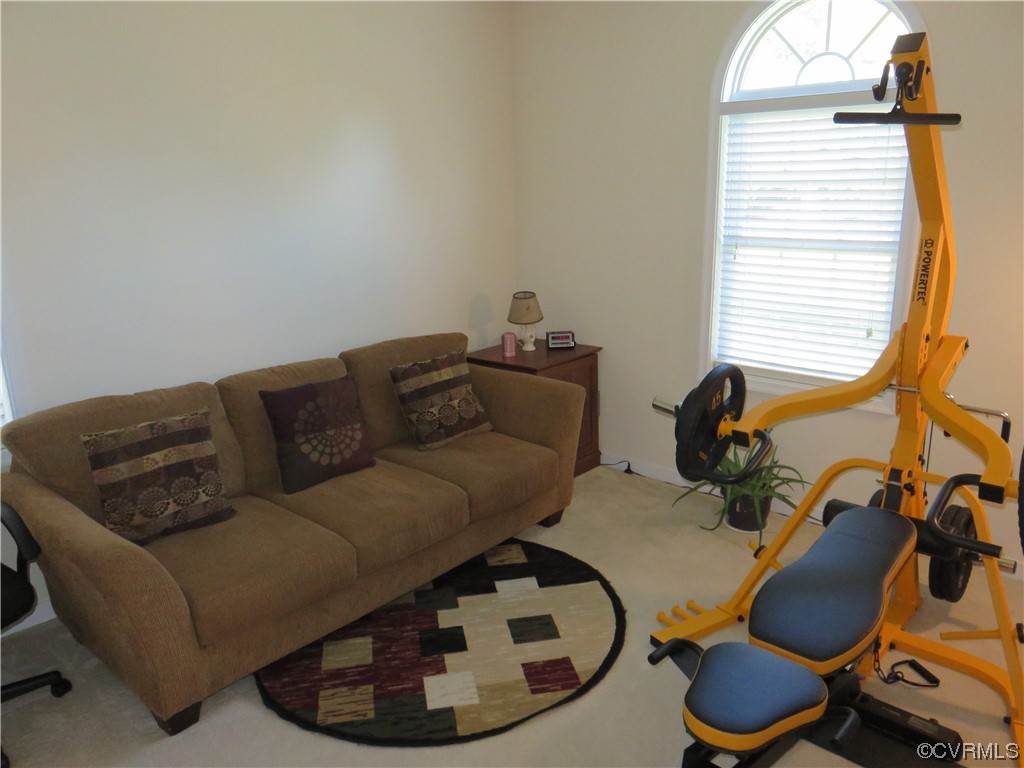 4740 Southmoor Road Richmond, VA 23234 - Photo 36 of 42 a living room with furniture and a window