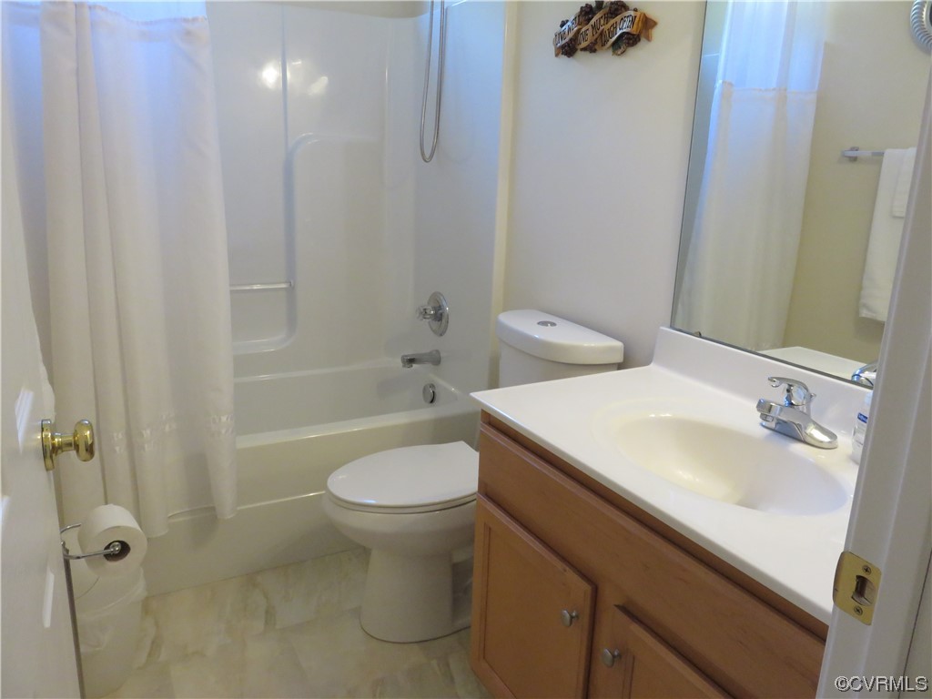 4740 Southmoor Road Richmond, VA 23234 - Photo 38 of 42 a bathroom with a sink toilet and shower