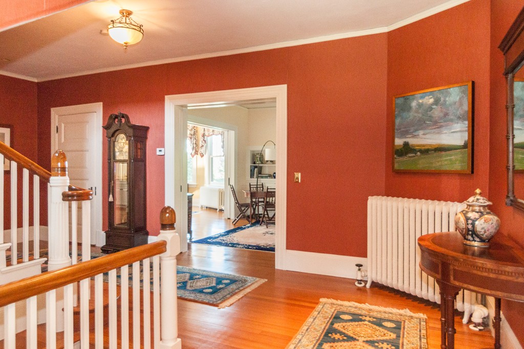 100 Nichols Road Cohasset, MA 02025 - Photo 12 of 30 a living room with furniture and a floor to ceiling window