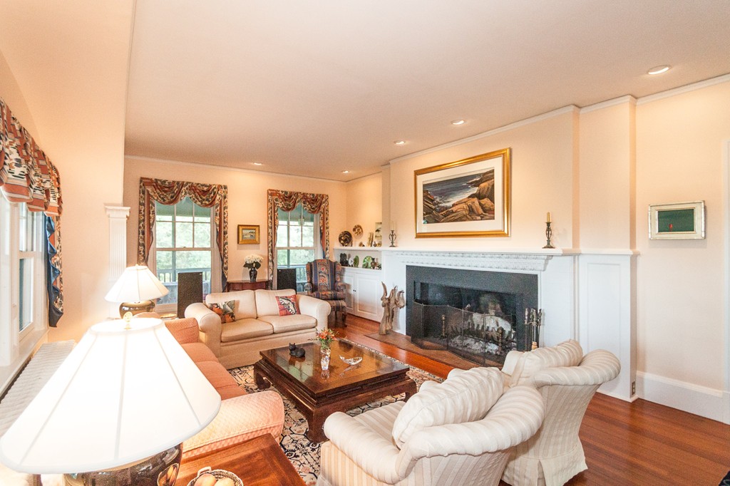 100 Nichols Road Cohasset, MA 02025 - Photo 14 of 30 a living room with furniture and a fireplace