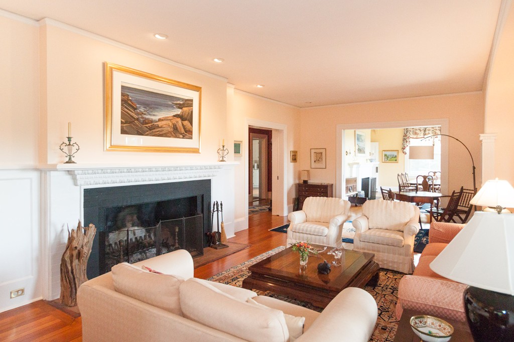 100 Nichols Road Cohasset, MA 02025 - Photo 15 of 30 a living room with furniture two window and a fireplace