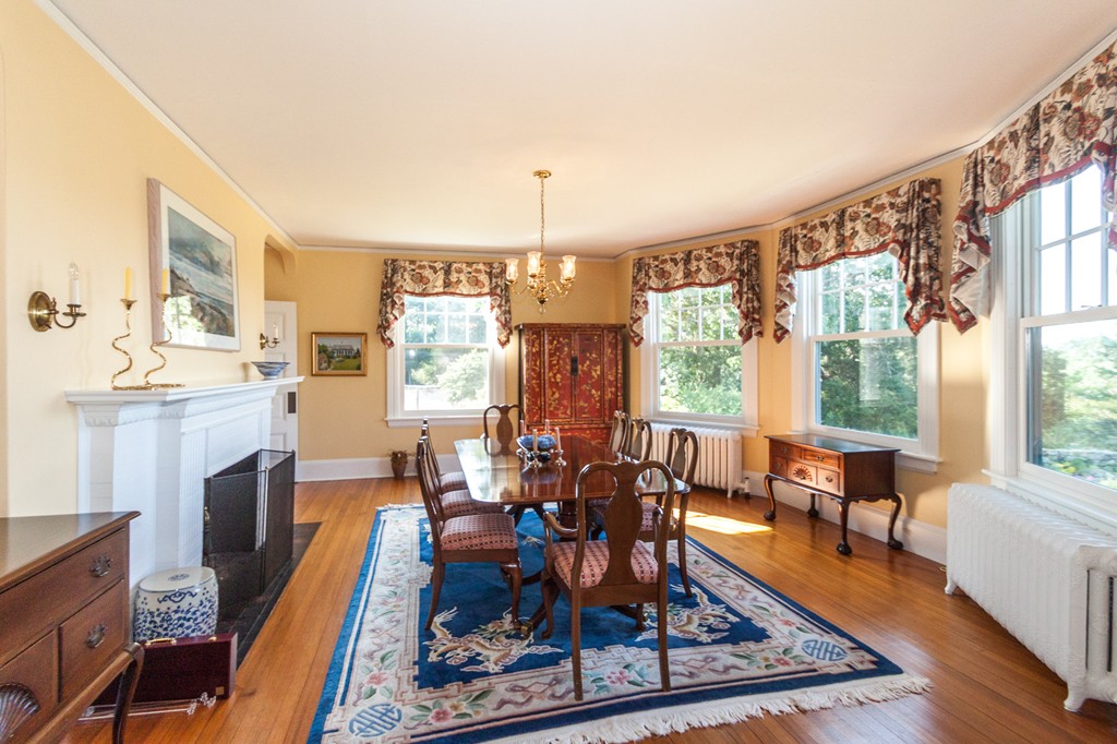 100 Nichols Road Cohasset, MA 02025 - Photo 16 of 30 a living room with fireplace furniture and a large window