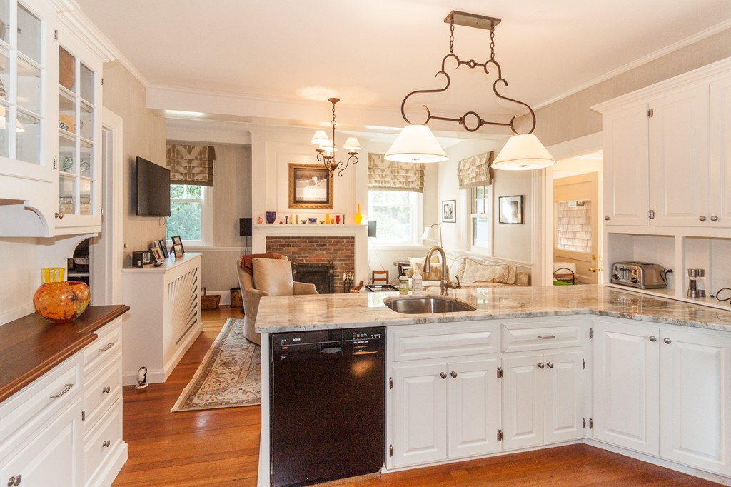 100 Nichols Road Cohasset, MA 02025 - Photo 19 of 30 a kitchen with white cabinets and sink