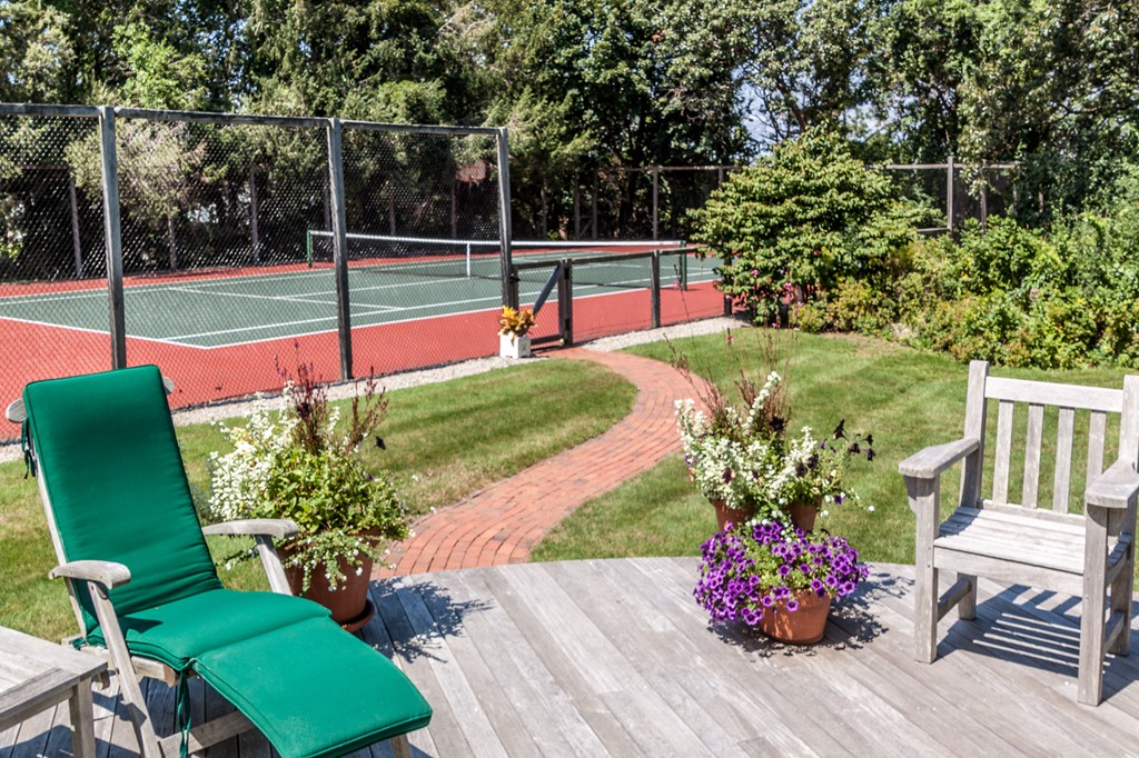 100 Nichols Road Cohasset, MA 02025 - Photo 21 of 30 a view of a backyard with sitting area