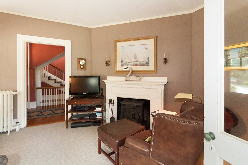 100 Nichols Road Cohasset, MA 02025 - Photo 22 of 30 a living room with furniture and a fireplace