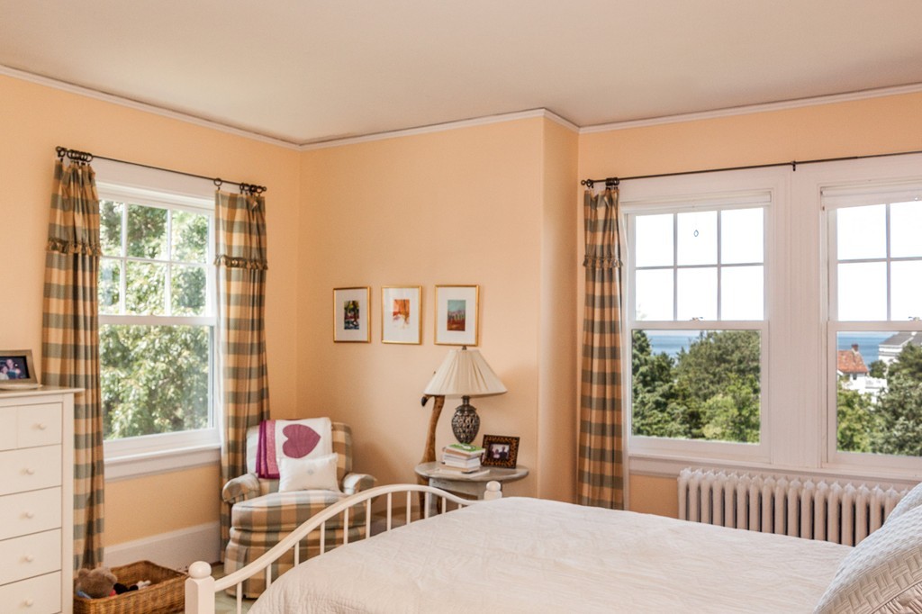 100 Nichols Road Cohasset, MA 02025 - Photo 27 of 30 a bedroom with furniture and a window