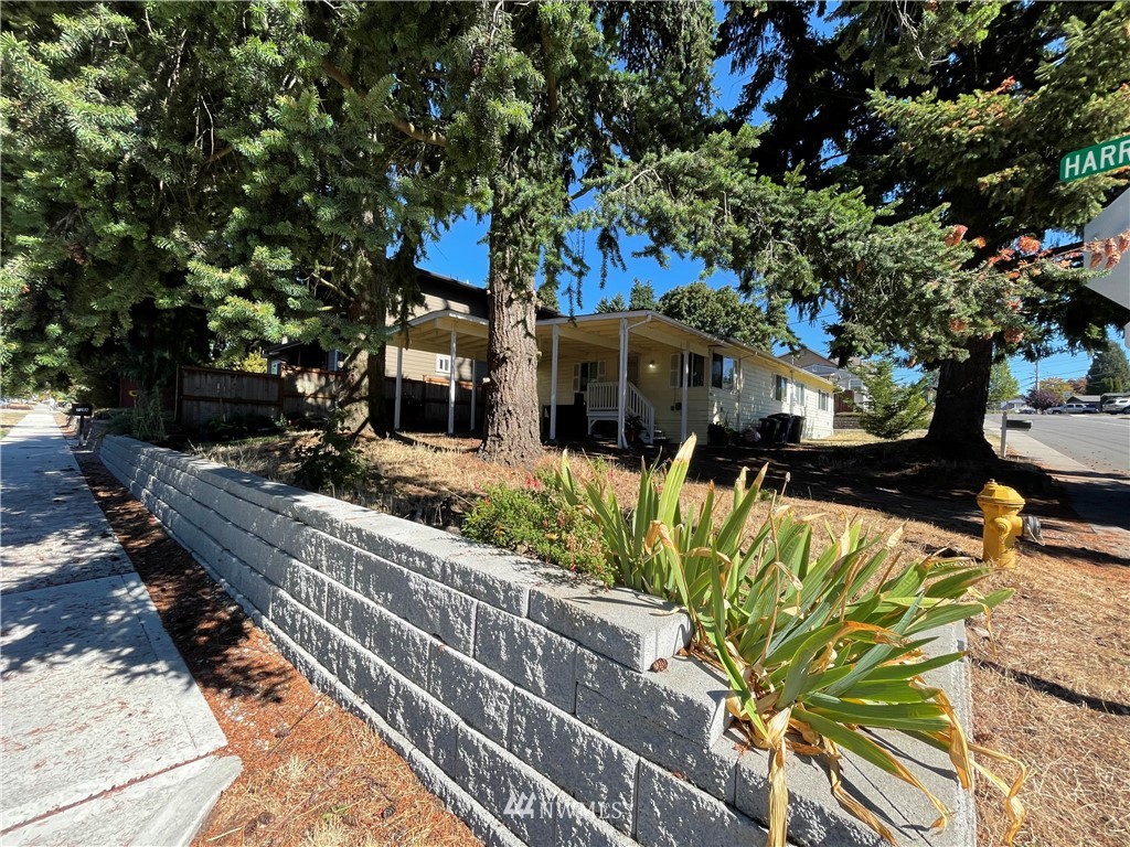 2804 Northeast 7th Street Renton, WA 98056 - Photo 1 of 29 a view of a house with a large tree