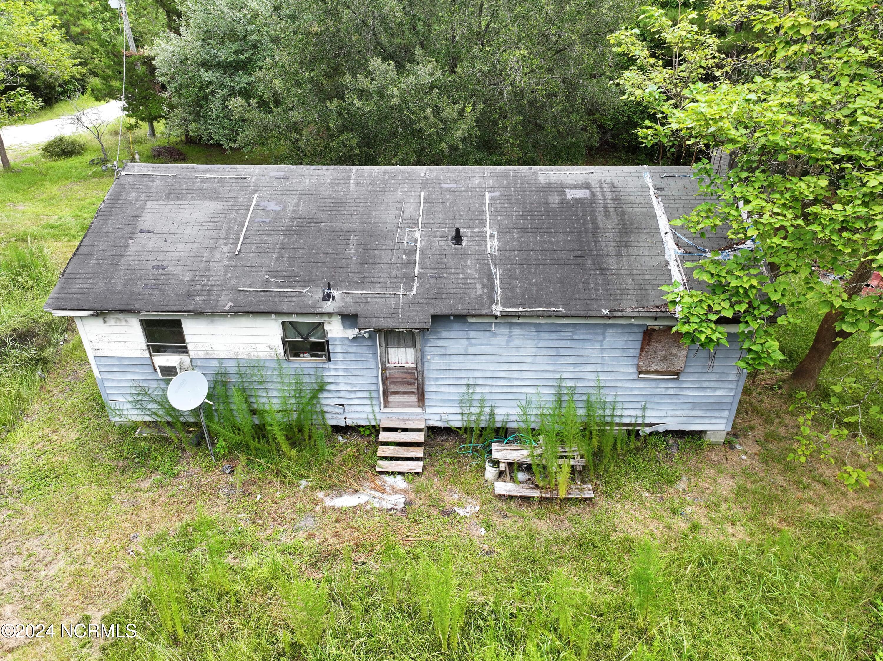 88 Berry Patch Road Hampstead, NC 28443 - Photo 2 of 4 dji_fly_20240805_111234_0076_17228730156