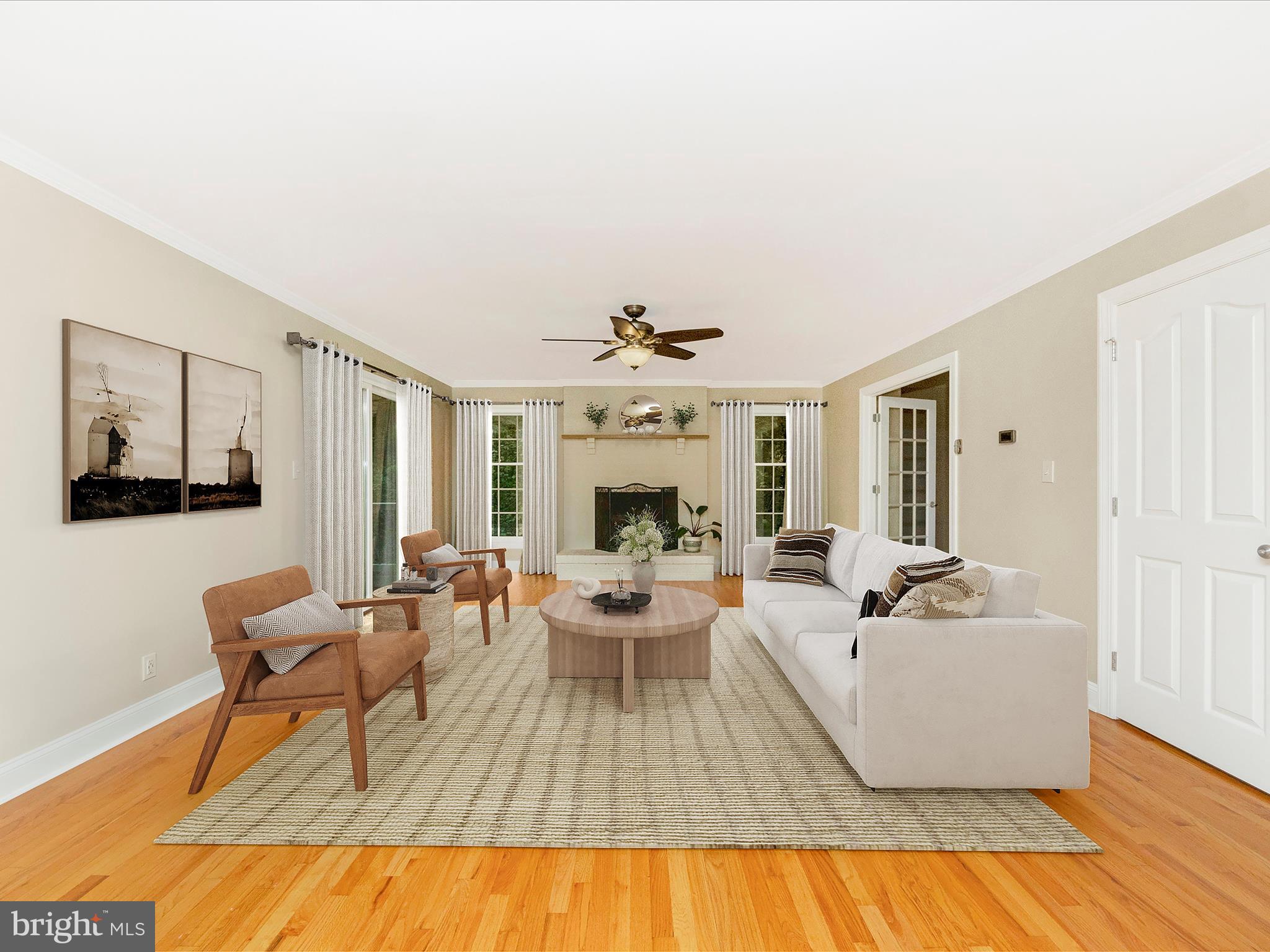 2668 Ogleton Road Annapolis, MD 21403 - Photo 15 of 51 a living room with furniture and a fireplace