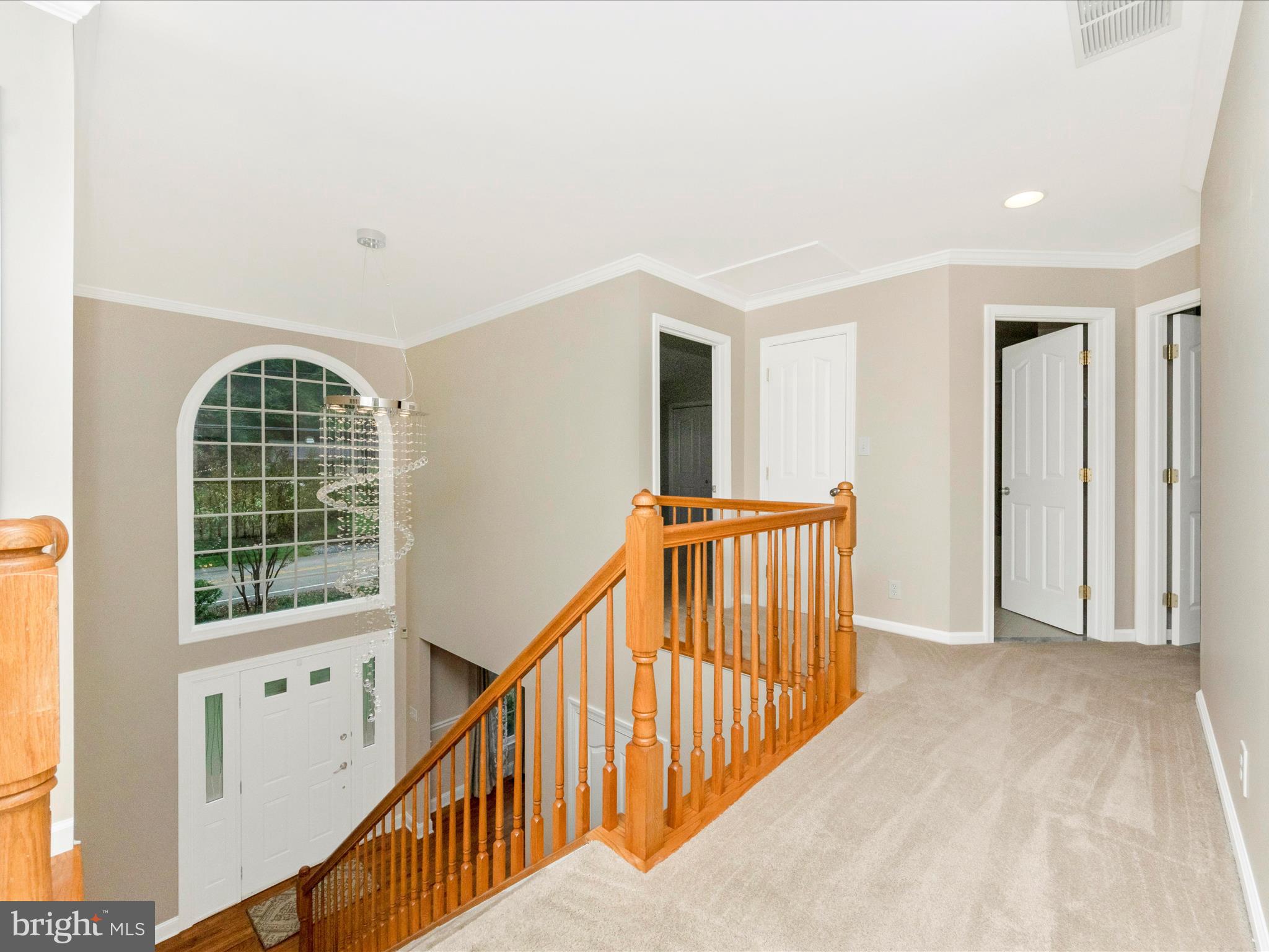 2668 Ogleton Road Annapolis, MD 21403 - Photo 20 of 51 a view of staircase with lots of wooden floor and windows