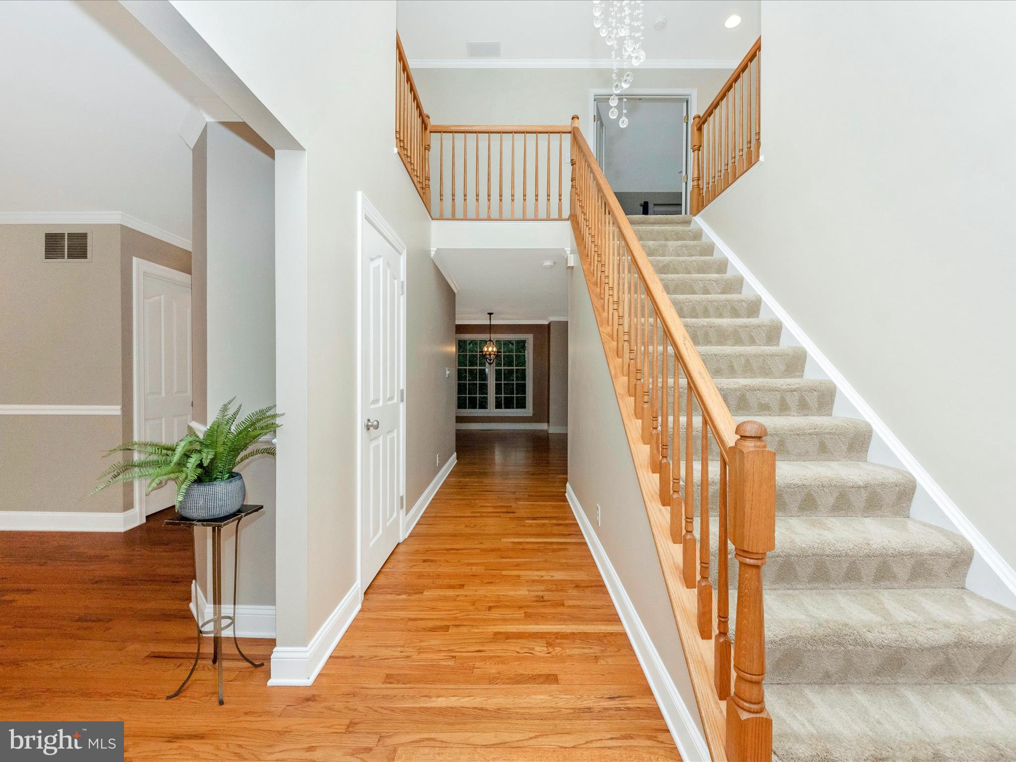 2668 Ogleton Road Annapolis, MD 21403 - Photo 2 of 51 a view of staircase with railing and white walls