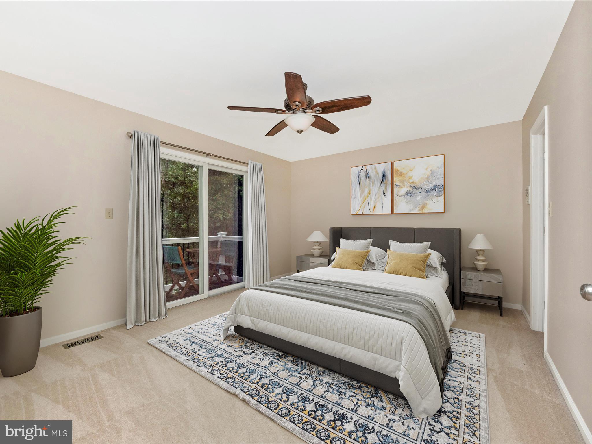 2668 Ogleton Road Annapolis, MD 21403 - Photo 21 of 51 a bedroom with a large bed and a chandelier
