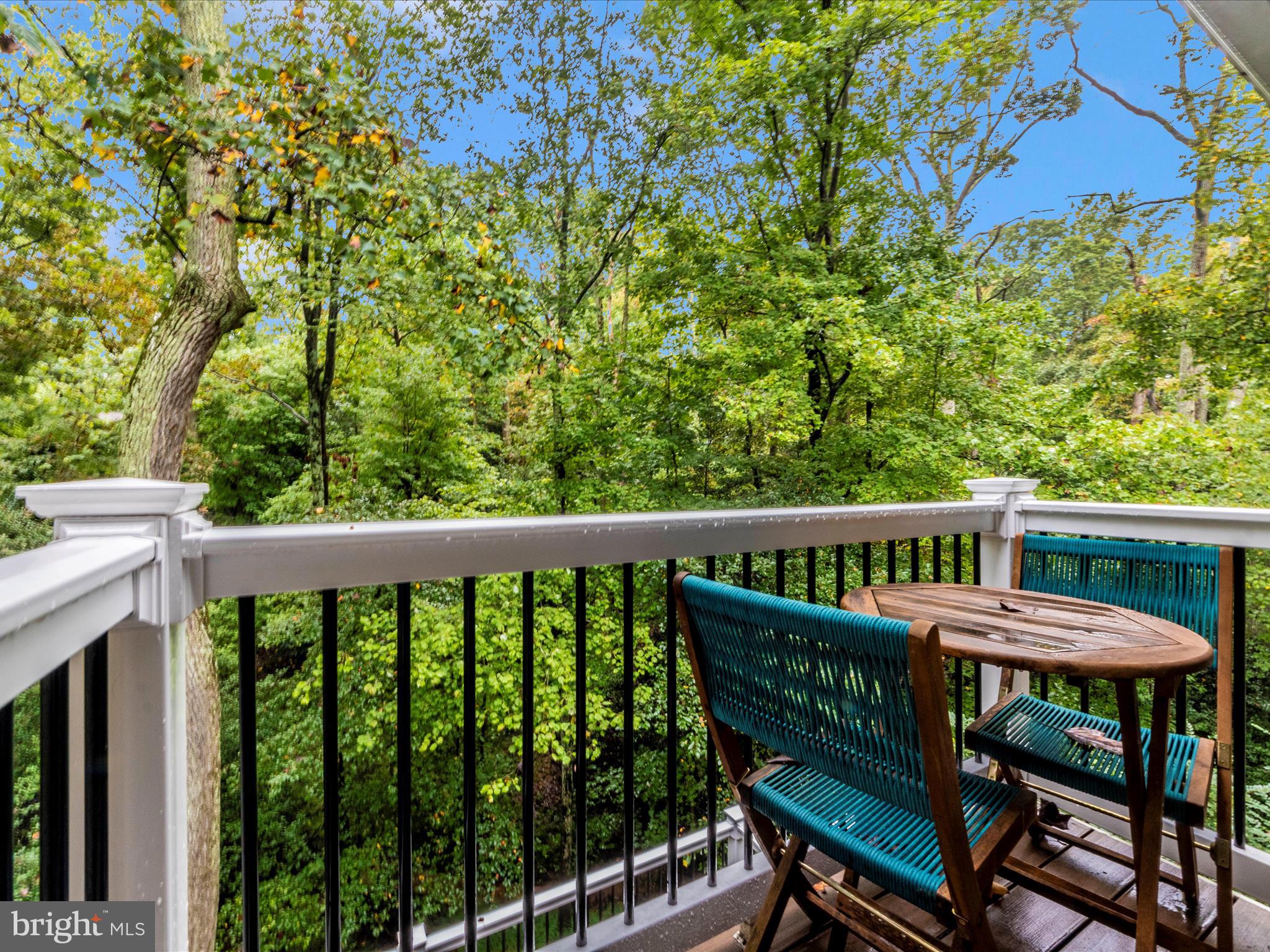 2668 Ogleton Road Annapolis, MD 21403 - Photo 23 of 51 a view of a wooden deck with a bench