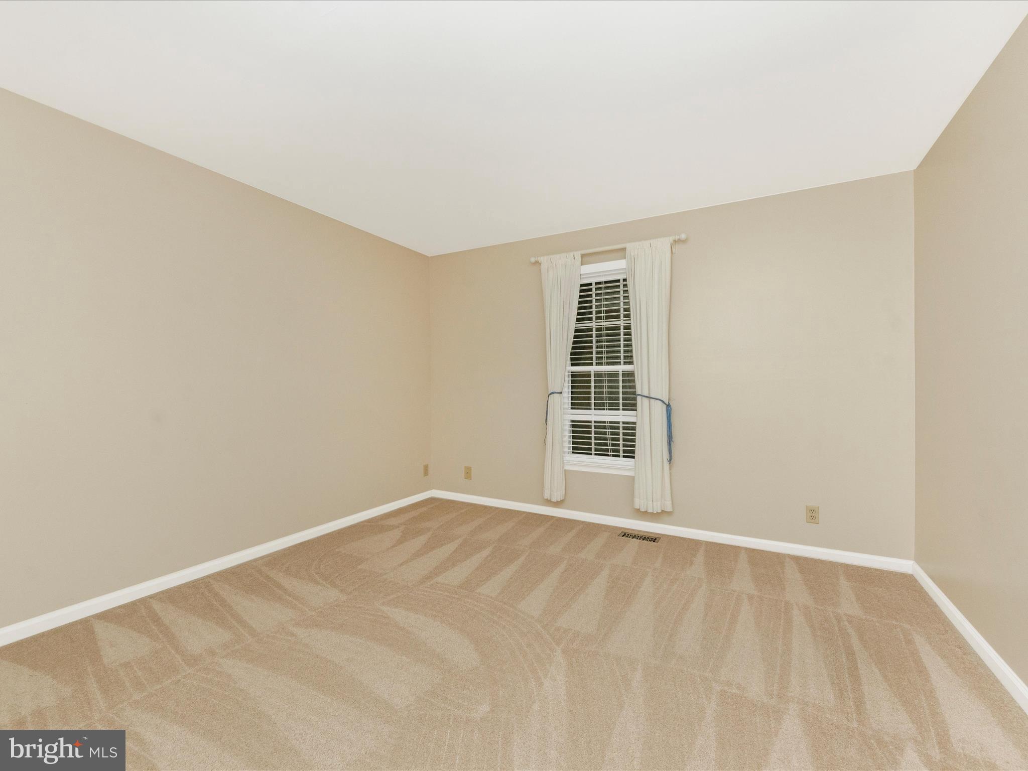2668 Ogleton Road Annapolis, MD 21403 - Photo 29 of 51 a view of an empty room with a window