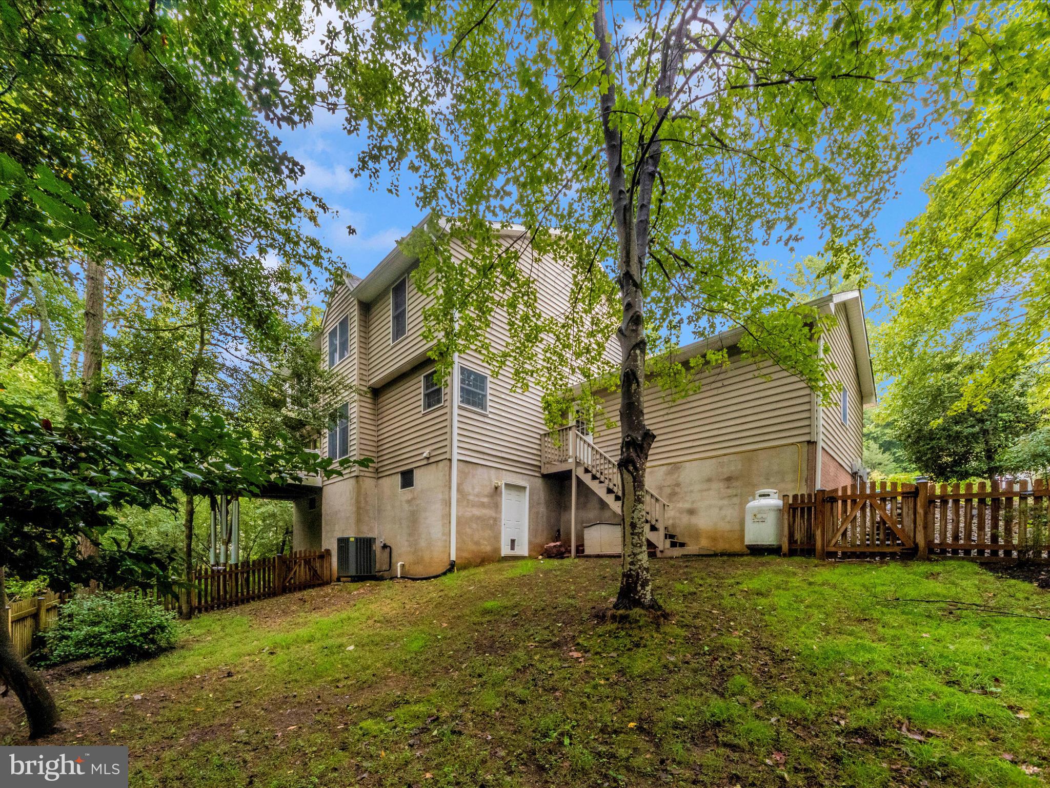 2668 Ogleton Road Annapolis, MD 21403 - Photo 34 of 51 a view of a house with a yard