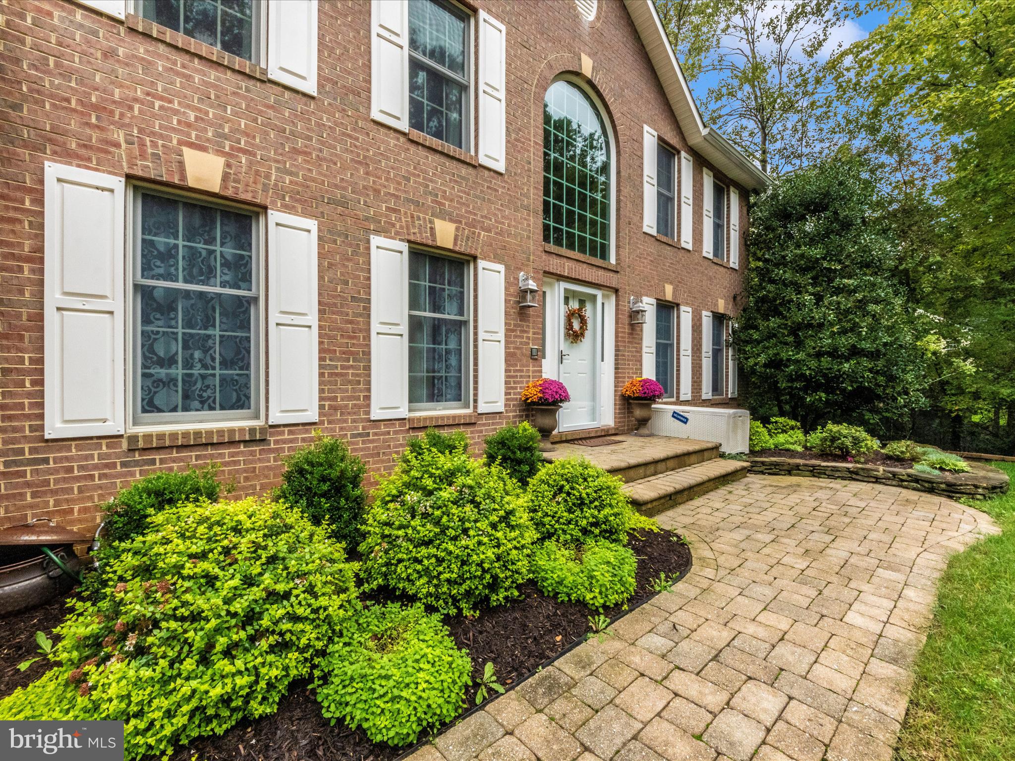 2668 Ogleton Road Annapolis, MD 21403 - Photo 37 of 51 a front view of a house with lots of green space
