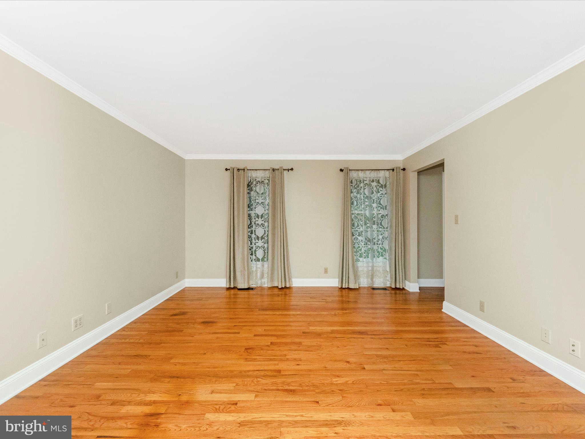 2668 Ogleton Road Annapolis, MD 21403 - Photo 4 of 51 a view of an empty room with wooden floor