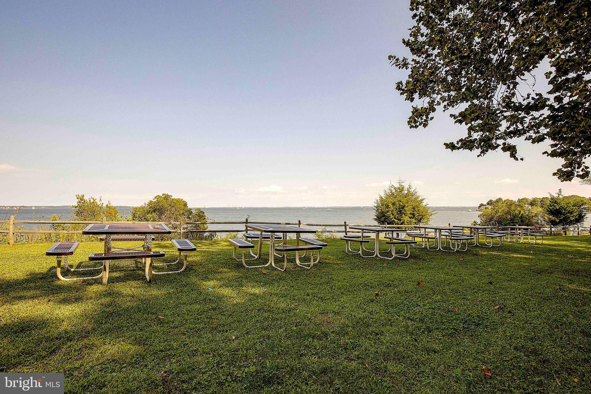 2668 Ogleton Road Annapolis, MD 21403 - Photo 44 of 51 a view of a lake with houses in the back