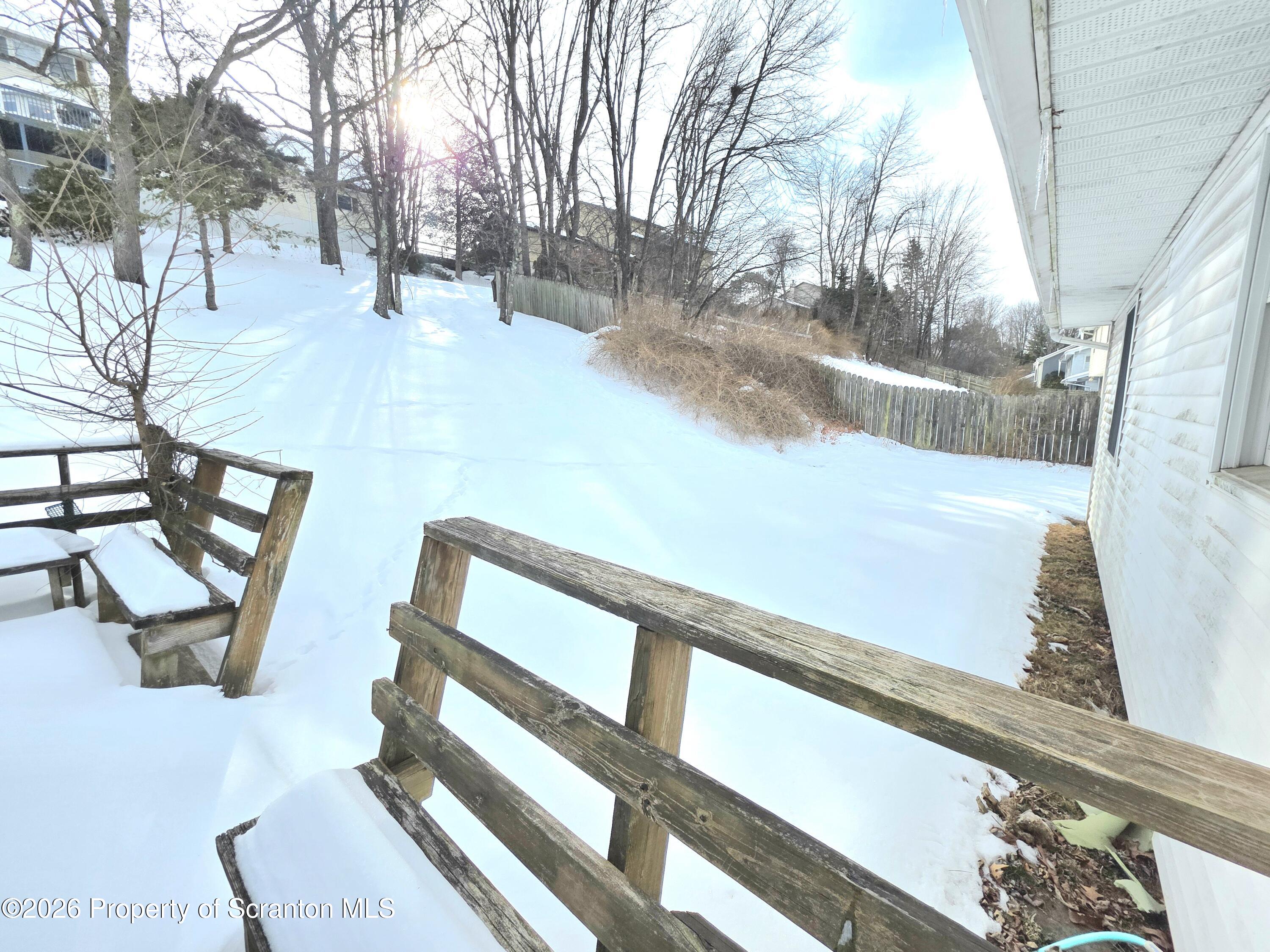 906 Violet Terrace Clarks Summit, PA 18411 - Photo 33 of 39 Back deck/ Yard