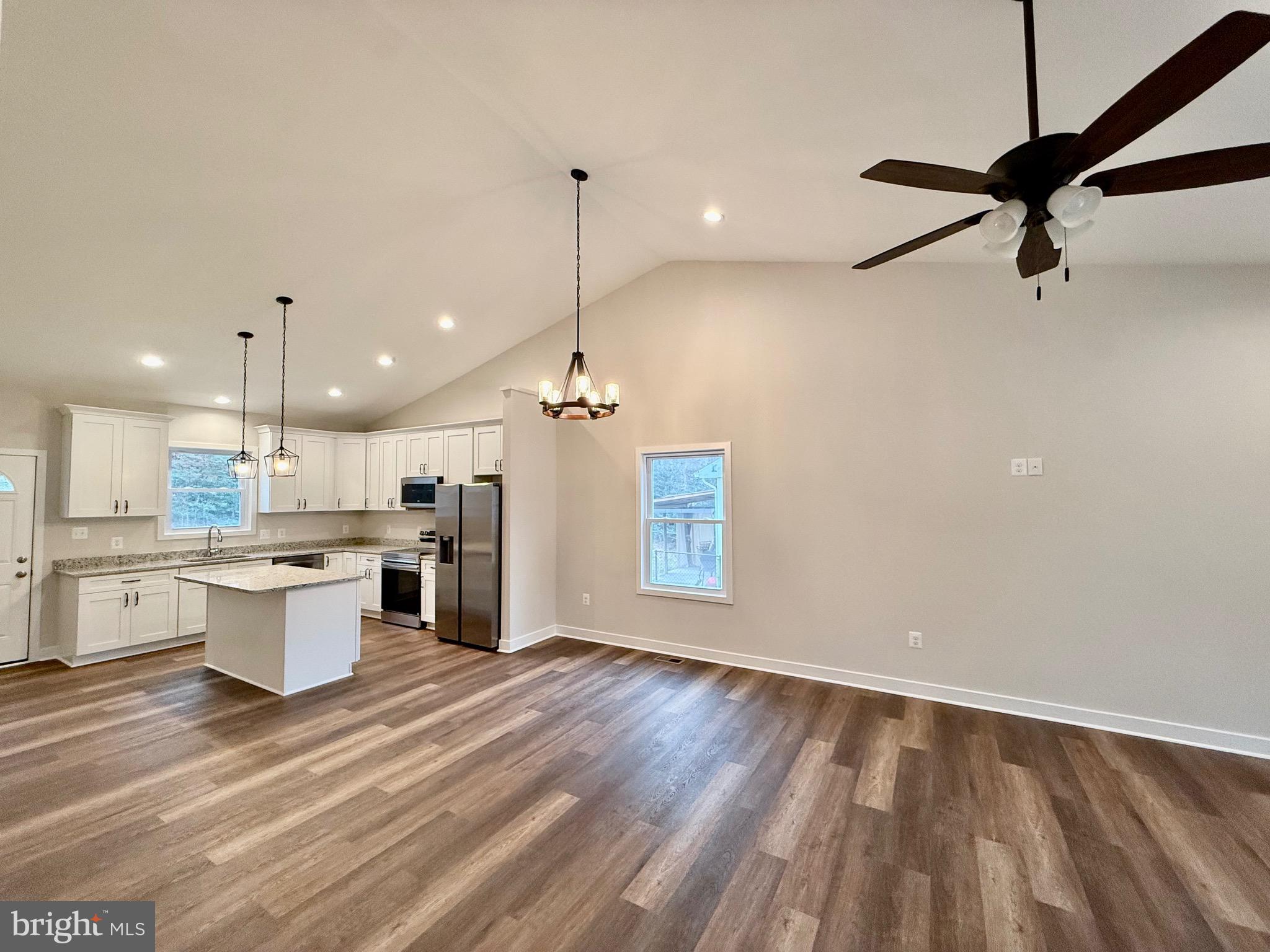 130 Poplar Lane Colonial Beach, VA 22443 - Photo 11 of 74 a large kitchen with a lot of counter space