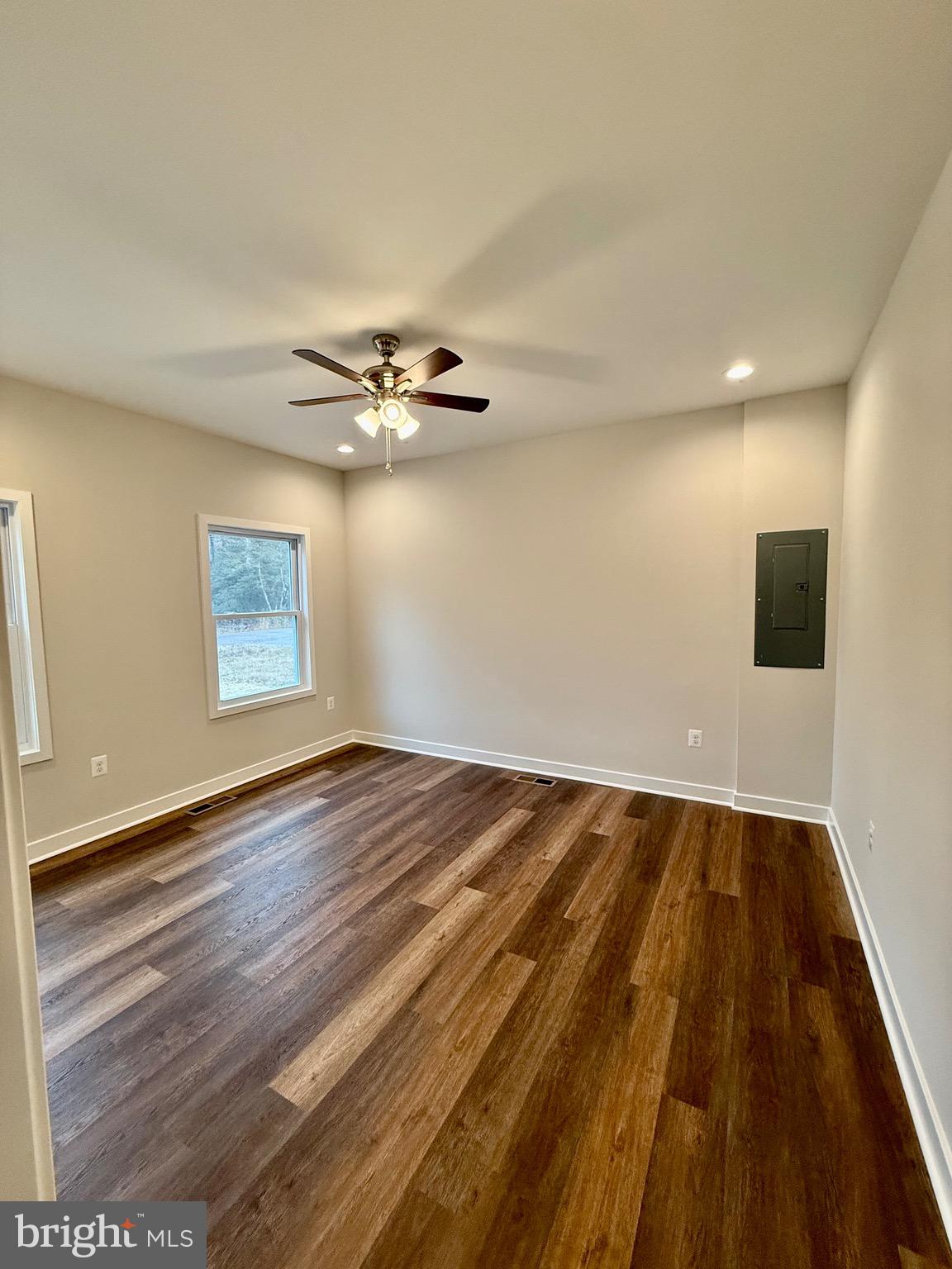 130 Poplar Lane Colonial Beach, VA 22443 - Photo 21 of 74 a view of an empty room with wooden floor