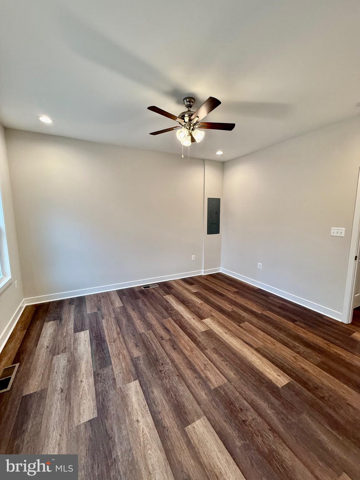 130 Poplar Lane Colonial Beach, VA 22443 - Photo 23 of 74 a view of empty room with wooden floor