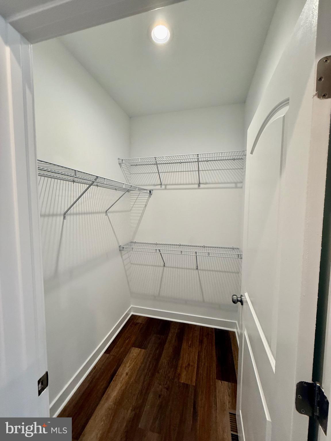 130 Poplar Lane Colonial Beach, VA 22443 - Photo 30 of 74 a view of storage and utility room with racks on the wall